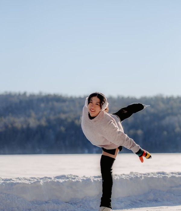 Woman feeling energetic and balanced in a bright, natural setting.